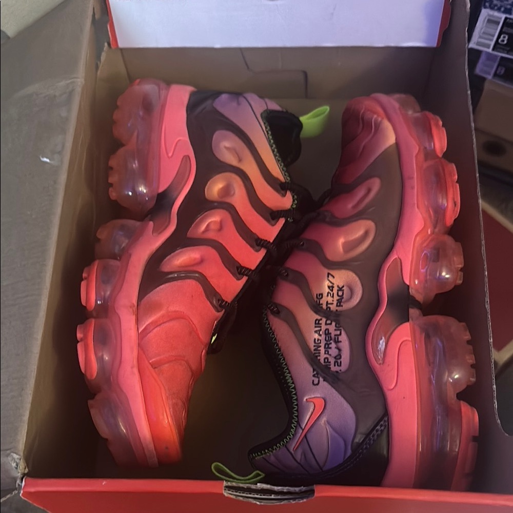 Nike Pink and Black Sneakers with Wavy Design